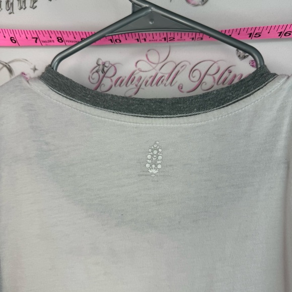 FP Movement Free People White Tank
Multicolor Watercolor Floral Motif shirt - Picture 9 of 15